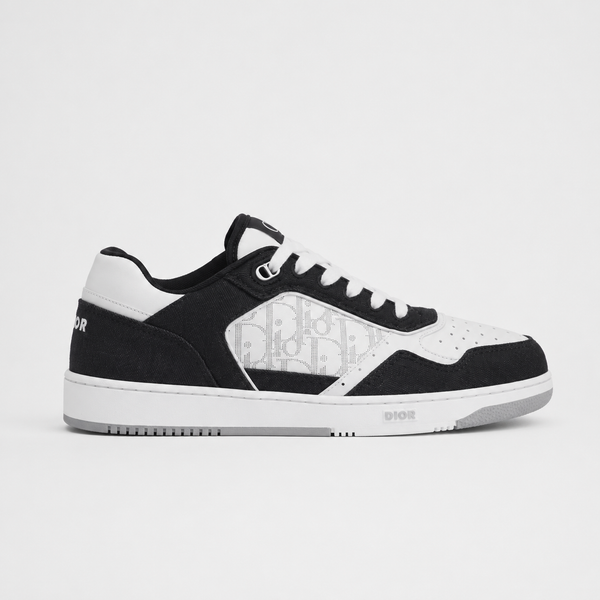 Dior B27 Uptown Low-Top White Black Oblique Galaxy sneaker, angled three-quarter view