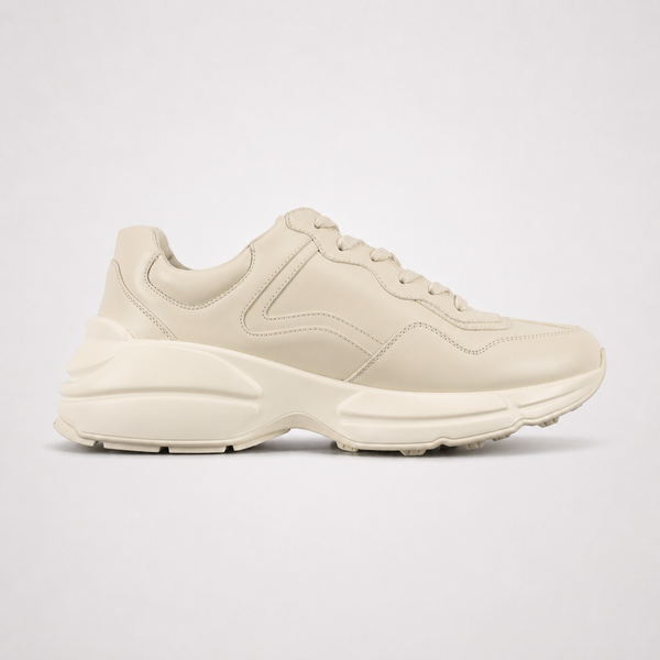 Gucci Rhyton Logo Ivory sneaker, angled three-quarter view